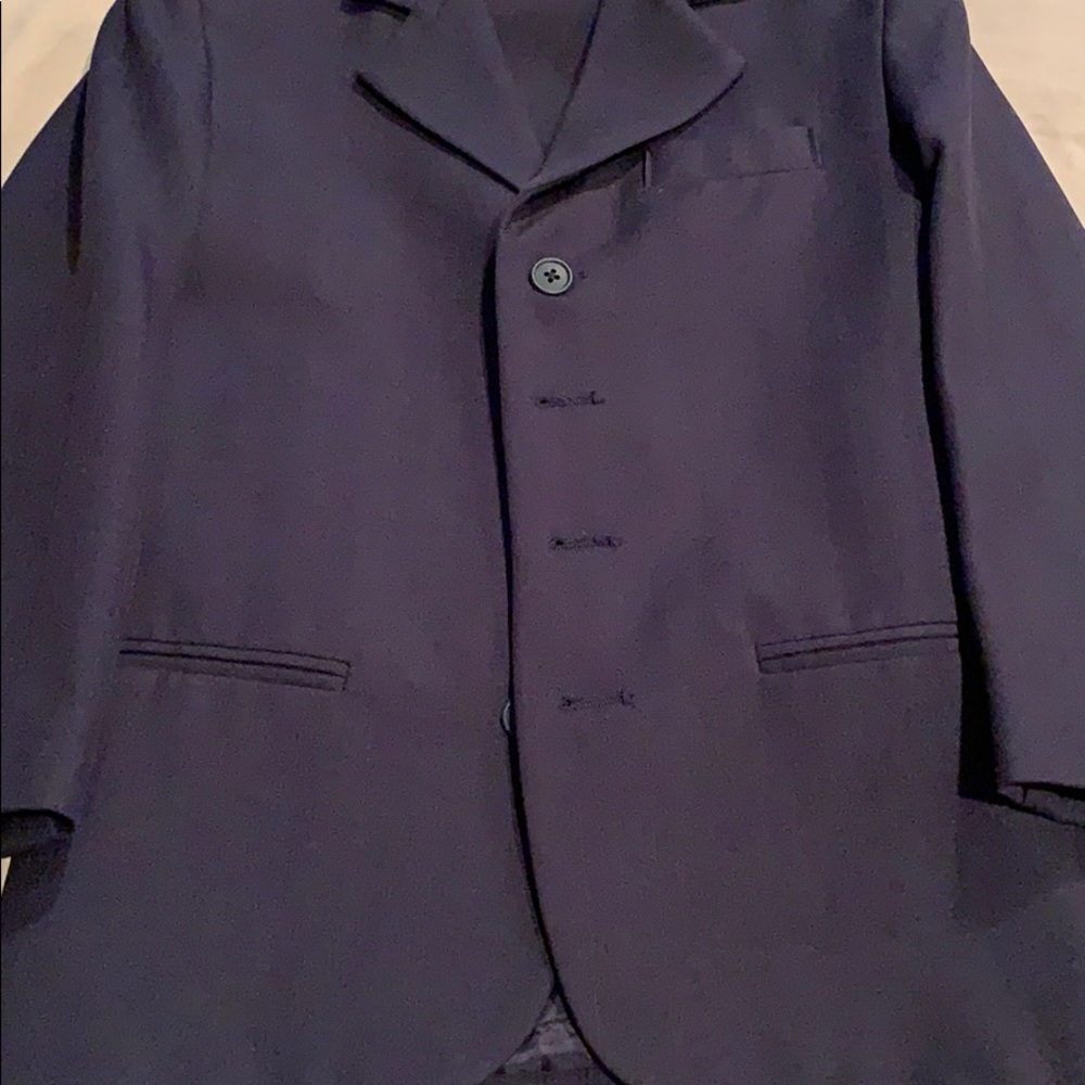 Navy blue boys’ suit.